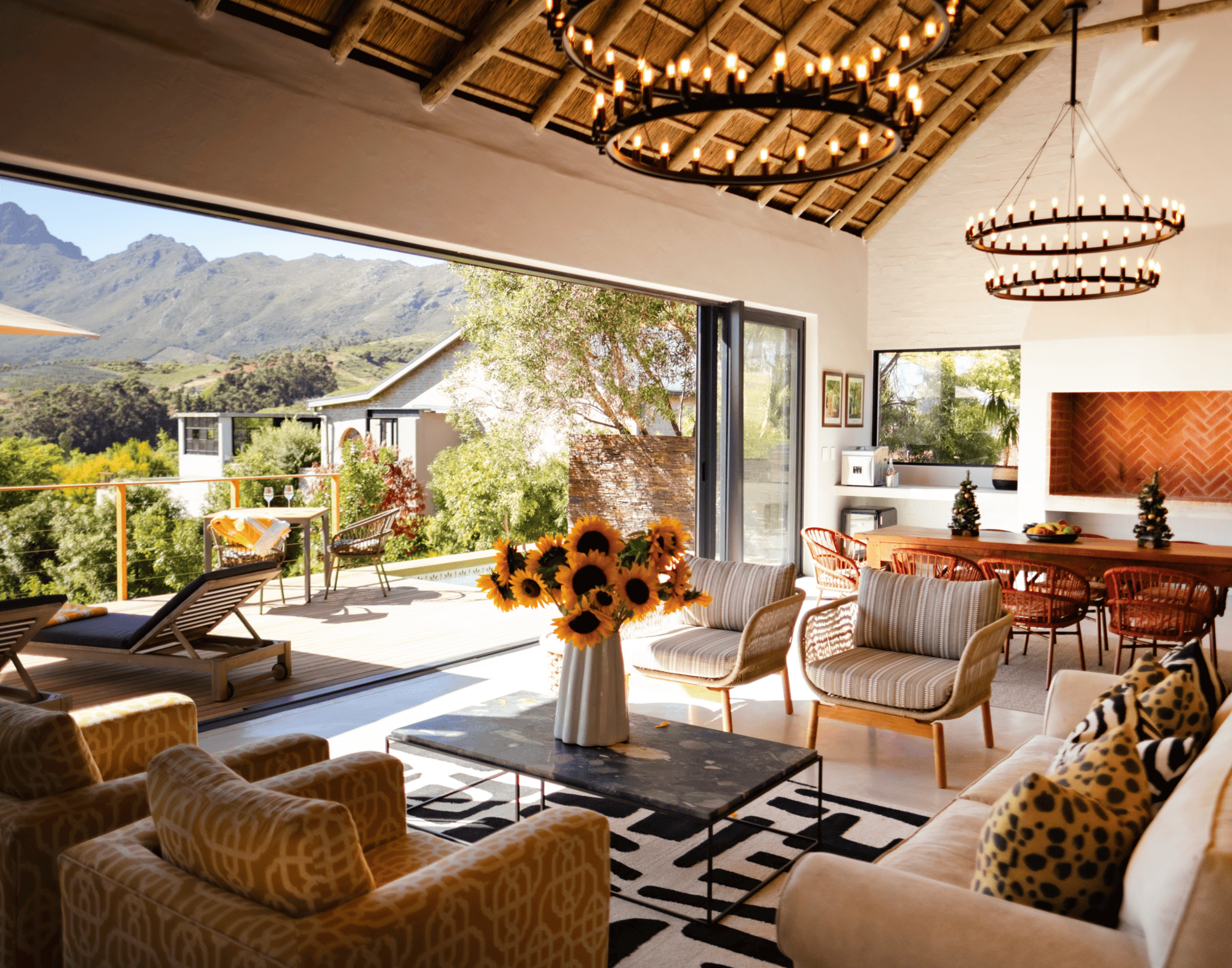 Luxury accommodation living room with mountain views and sunflower; part of your experience at Zeven Eike